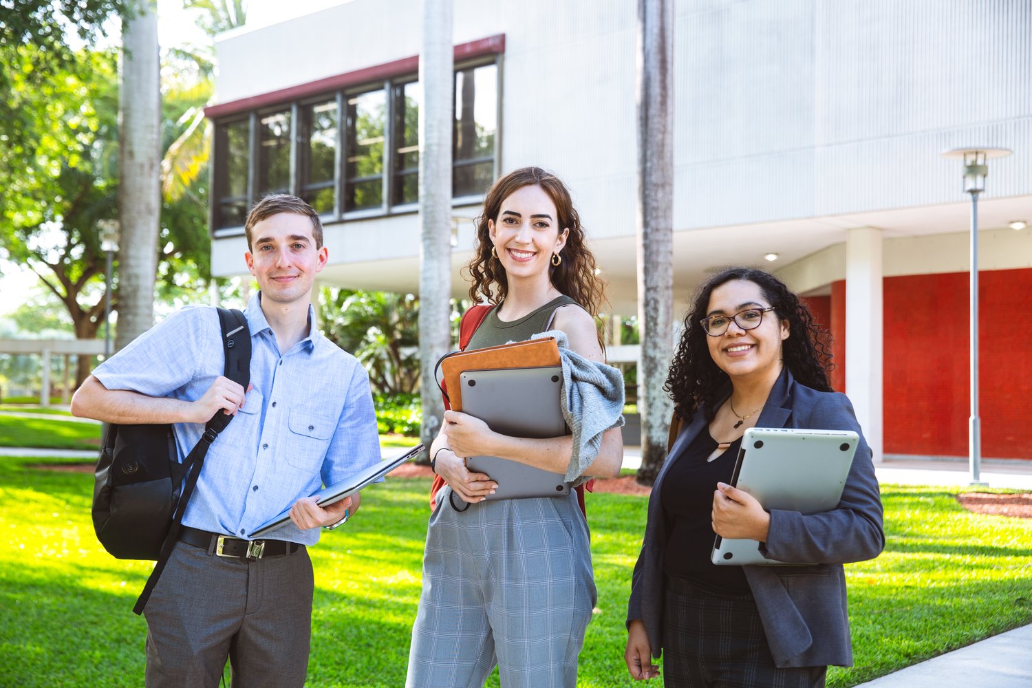 3 Students smiling, student photos 3 Students smiling, student photos